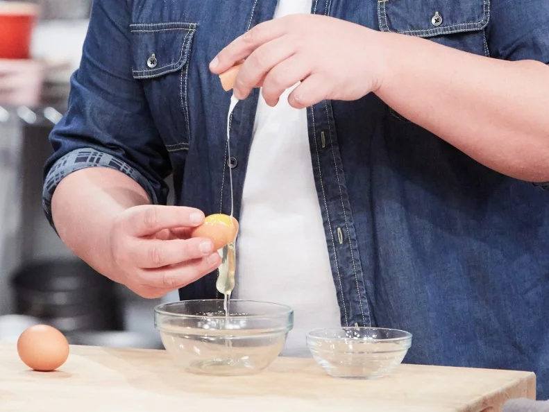 Host Duff Goldman preparing his dish, Homemade S'Mores, as seen on Food Network's Holiday Baking Championship: Duff's Sweet Spot, Season 3.