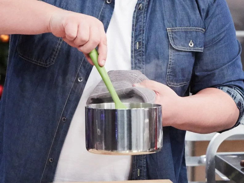 Host Duff Goldman preparing his dish, Homemade S'Mores, as seen on Food Network's Holiday Baking Championship: Duff's Sweet Spot, Season 3.