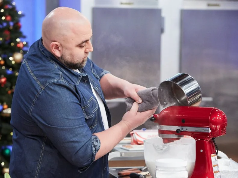 Host Duff Goldman preparing his dish, Homemade S'Mores, as seen on Food Network's Duff's Sweet Spot, Season 3.