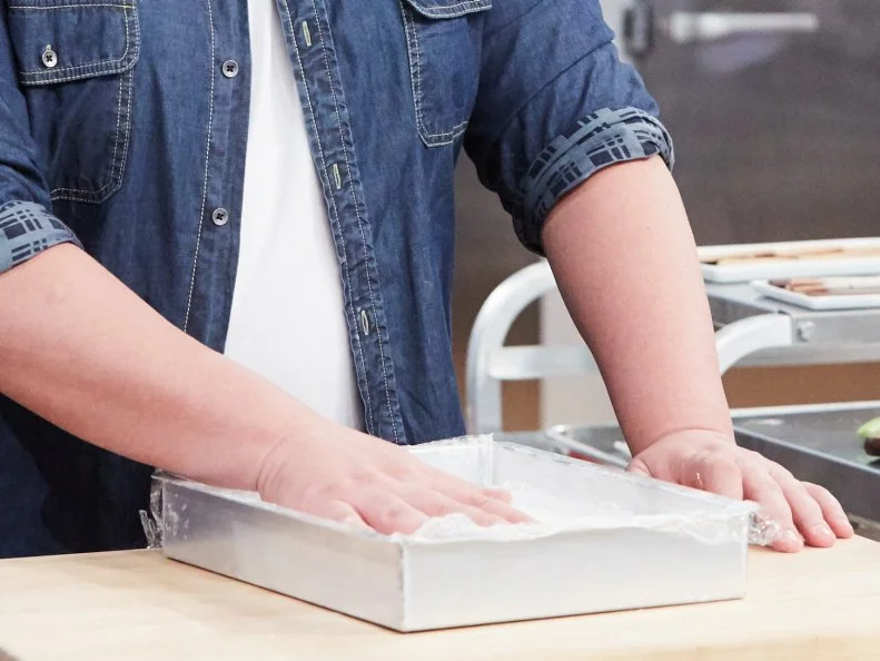 Host Duff Goldman preparing his dish, Homemade S'Mores, as seen on Food Network's Duff's Sweet Spot, Season 3.