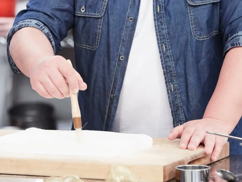 Host Duff Goldman preparing his dish, Homemade S'Mores, as seen on Food Network's Duff's Sweet Spot, Season 3.