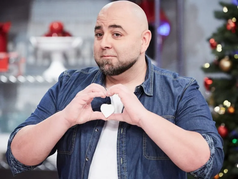 Host Duff Goldman preparing his dish, Homemade S'Mores, as seen on Food Network's Holiday Baking Championship: Duff's Sweet Spot, Season 3.