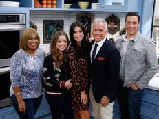 Hosts Sunny Anderson, Marcela Valladolid, Katie Lee, Geoffrey Zakarian and Jeff Mauro pose together, as seen on Food Network's The Kitchen, Season 11.