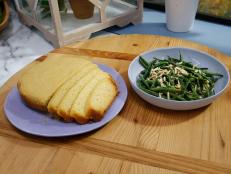 Marcela Valladolid's slow cooker cornbread and Geoffrey Zakarian's toaster oven green beans are displayed, as seen on Food Network's The Kitchen, Season 11.