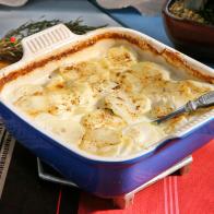 Sunny Anderson's Scalloped Sage Potatoes dish is displayed, as seen on Food Network's The Kitchen, Season 11.