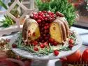 Jeff Mauro and Marcela Valladolid's Orange Cranberry Bundt Cake is displayed, as seen on Food Network's The Kitchen, Season 11.
