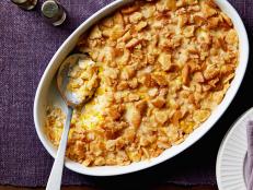 White Cheddar cheese and buttery cracker crumbs top this classic side made from frozen sweet corn and creamy half-and-half.