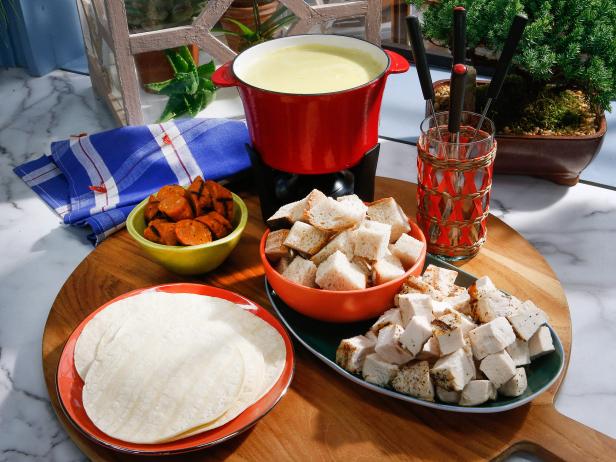 Marcela Valladolid's Poblano and Corn Queso Fundido dish is displayed, as seen on Food Network's The Kitchen, Season 11.