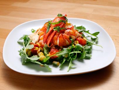 Mentor Anne Burrell's Poached Lobster over Corn and Cherry Tomato Salad is displayed, as seen on Food Network's Worst Cooks in America, Season 10.