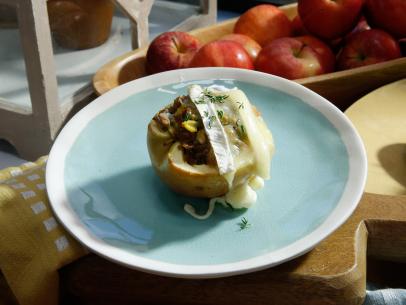 Jeff Mauro's Sausage and Sage Stuffed Apple is displayed, as seen on Food Network's The Kitchen, Season 11.