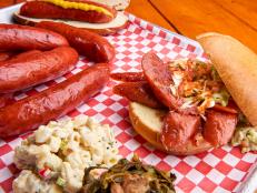 <p>Barbecue master Chuck Frommer has the best barbecue in Vegas and the locals know it. Guy fell in love with the hot links, which are cured for 16 hours and smoked for six, and savored the flavorful ribs. The pulled pork and mac 'n' cheese are also popular.</p>