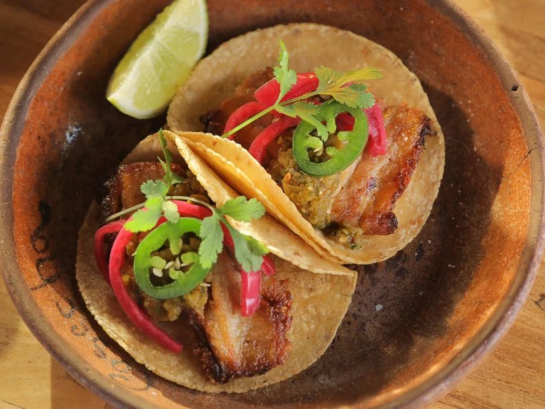 WS of the pork belly tacos from Cosecha Café in Oakland, CA as seen on Food Network's Diners, Drive-Ins and Dives episode DV2406.