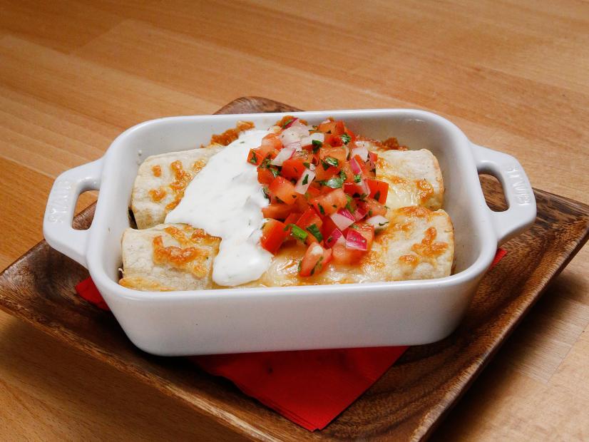 Mentor Anne Burrell's Chicken and Tomatillo Enchiladas dish is displayed, as seen on Food Network's Worst Cooks in America, Season 10.