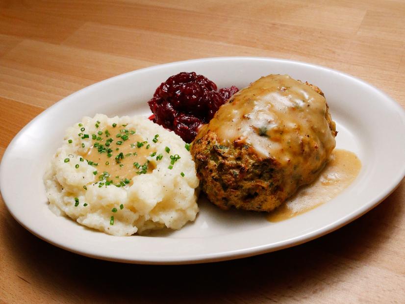 Mentor Rachael Ray's Nutty Turkey Loaf with Cracked Cranberry and Orange Sauce dish is displayed, as seen on Food Network's Worst Cooks in America, Season 10.