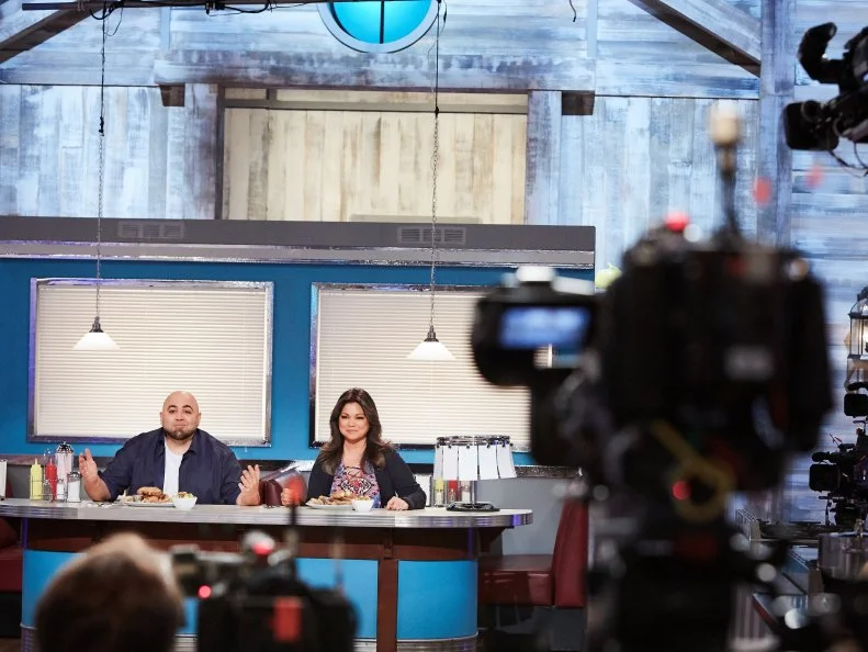 Hosts Duff Goldman and Valerie Bertinelli during the reveal of the Main Heat, as seen on Food Network's Kids Baking Championship, Season 3.