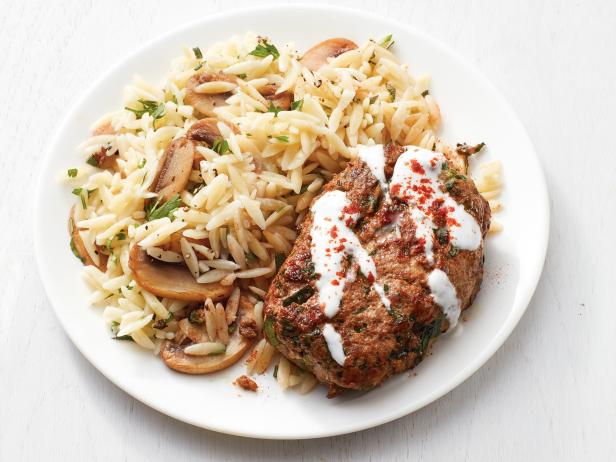 https://food.fnr.sndimg.com/content/dam/images/food/fullset/2016/12/17/4/FNM010117_Mini-Meatloves-with-Mushroom-Herb-Orzo-Recipe_s4x3.jpg.rend.hgtvcom.616.462.suffix/1482181368317.jpeg