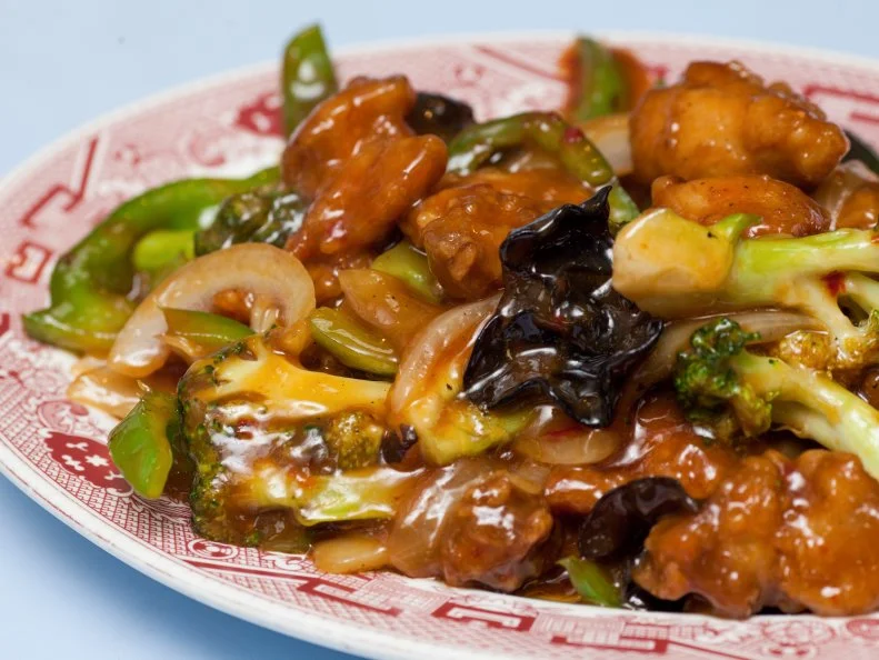 Named after Tso Tsung-t’ang, a fearsome 19th-century general from China’s Hunan province, General Tso’s chicken is considered the most famous Hunanese dish on planet. It’s actual origin, however, is rather complex. The fried, slightly spicy dish is most popularly believed to be created by a talented Hunanese native, Chef Peng Chang-kuei, at some point in the 1950’s, somewhere outside of China. Chang-kuei’s creation evolved into its current incarnation when he opened his first restaurant in Midtown in New York City in the early 1970’s, adding a bit of sugar to cater to sugar-loving Americans’ palates. Henry Kissinger became an adoring fan, and so did the rest of New York. Chang-kuei left the U.S., but his legacy remains on Chinese menus around the country. Try it at Wo Hop, a Chinatown stalwart since 1938. 
