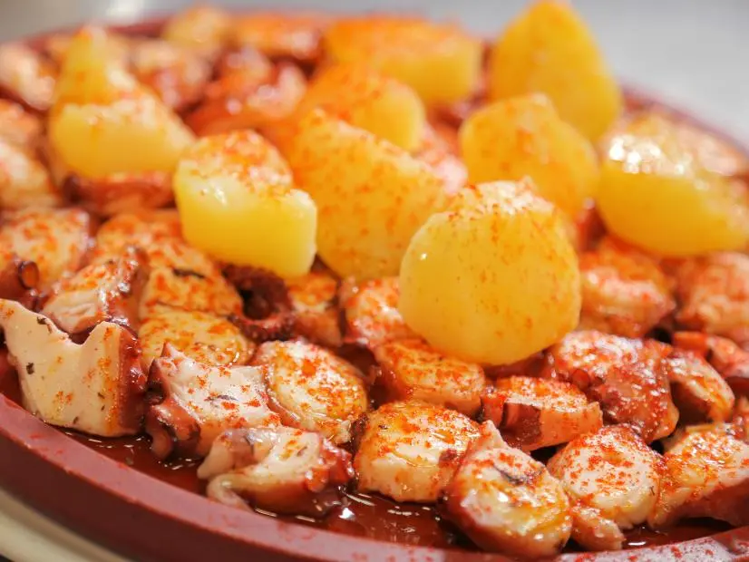 Galician Style Octopus as served at Pulperia a Gudina in Barcelona, Spain as seen on Food Network's Diners, Drive-Ins and Dives episode 2602.