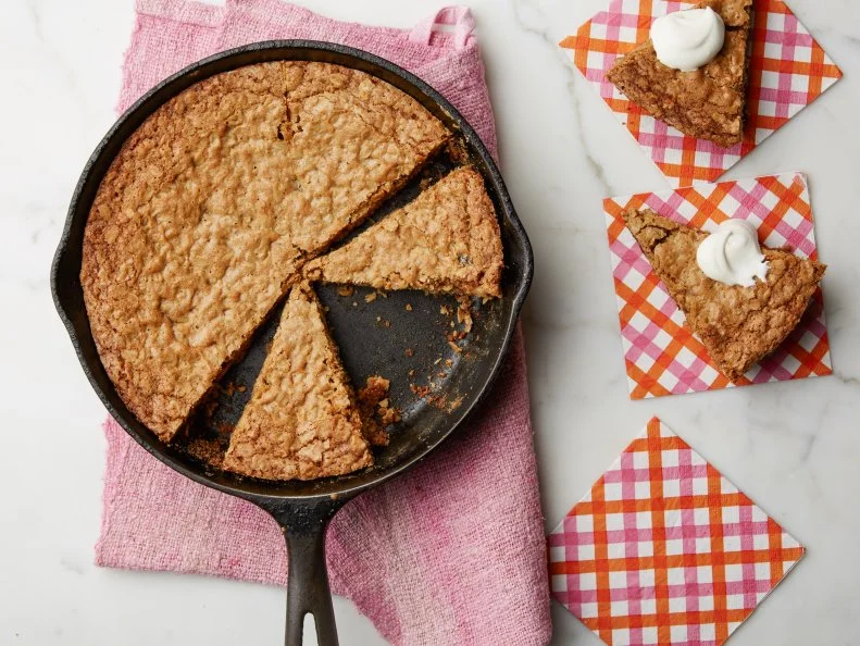 Food Network Kitchen’s Oatmeal Raisin Cookie with Honeyed Whipped Cream Skillet Cookie for Comfort All of the Skillet Cookies, as seen on Food Network