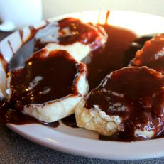 Chocolate gravy over biscuits at Gadwall's Grill in North Little Rock, Arkansas as included in Arkansas's Most Iconic Eats for FoodNetwork.com