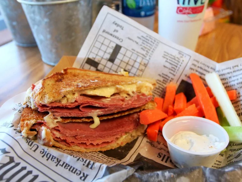 The Reuben sandwich with carrots and dip at The Hive Cafe in White Hall, Arkansas as included in Arkansas's Most Iconic Eats for FoodNetwork.com