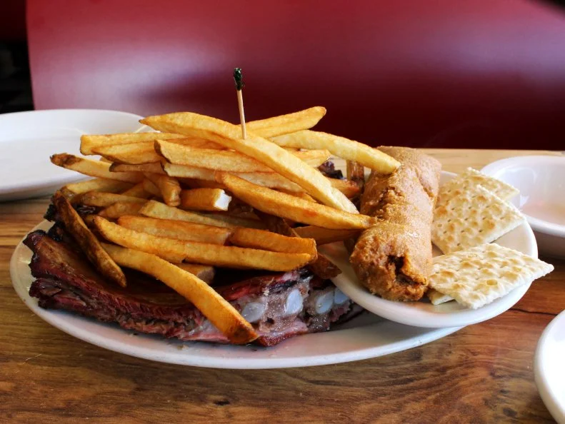 The Rib and Fries plate with a tamale at McClard's Barbecue in Hot Springs, Arkansas as included in Arkansas's Most Iconic Eats for FoodNetwork.com