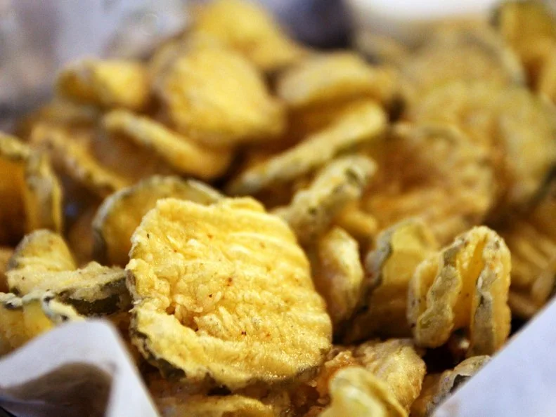 Fried pickle chips at Sassy's Red House in Fayetteville, Arkansas as included in Arkansas's Most Iconic Eats for FoodNetwork.com
