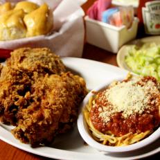 The Venesian Inn's fried chicken and spaghetti, as included in Arkansas's Most Iconic Eats for FoodNetwork.com