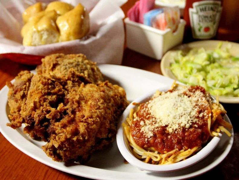 The Venesian Inn's fried chicken and spaghetti, as included in Arkansas's Most Iconic Eats for FoodNetwork.com