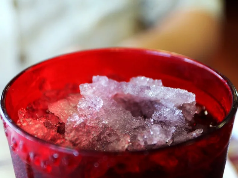 A red cupful of Grapette soda at Woods Place in Camden, Arkansas as included in Arkansas's Most Iconic Eats for FoodNetwork.com