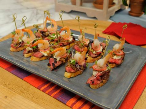Surf and Turf Rib-Eye Crostini with Gorgonzola Mousse and Caramelized Bourbon Shallots