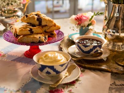 Beauty shot of the Blueberry Lemon Scones with a side of Honey Butter and Blackberry Jam during High Tea: Celebrating Moms, as seen on Cooking Channel's Dinner at Tiffani's, Season 2.
