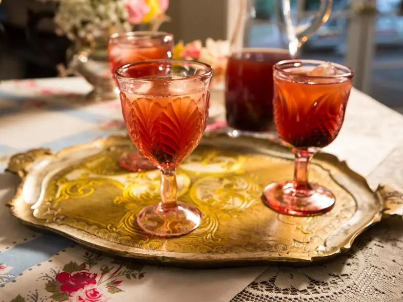 Beauty shot of the Cherry Green Tea Cocktail during High Tea: Celebrating Moms, as seen on Cooking Channel's Dinner at Tiffani's, Season 2.