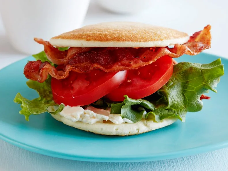 12 THINGS YOU SHOULD MAKE WITH PANCAKES  1. Pancake Grilled Cheese 2. BLT Pancake 3. Peanut Butter and Jelly Pancake Sandwich 4. Pancake Ice Cream Sandwich 5. Pancake Tacos 6. Pancake Whoopie Pies 7. PancakeCake 8. Pancake Bread Pudding 9. Pancake Parfait 10.Pancake Eggs Benedict 11.Pancake Quesadilla 12.Pancake Canapes 12 Things You Should Make with Pancakes Food Network Kitchen Food Network Grilled Cheese, BLT, Peanut Butter and Jelly, Tacos, Ice Cream Sandwich, Whoopie Pies, PancakeCake, Bread Pudding, Pancake Parfait, Eggs Benedict, Quesadilla, Canapes