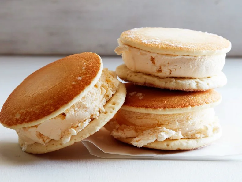 12 THINGS YOU SHOULD MAKE WITH PANCAKES  1. Pancake Grilled Cheese 2. BLT Pancake 3. Peanut Butter and Jelly Pancake Sandwich 4. Pancake Ice Cream Sandwich 5. Pancake Tacos 6. Pancake Whoopie Pies 7. PancakeCake 8. Pancake Bread Pudding 9. Pancake Parfait 10.Pancake Eggs Benedict 11.Pancake Quesadilla 12.Pancake Canapes 12 Things You Should Make with Pancakes Food Network Kitchen Food Network Grilled Cheese, BLT, Peanut Butter and Jelly, Tacos, Ice Cream Sandwich, Whoopie Pies, PancakeCake, Bread Pudding, Pancake Parfait, Eggs Benedict, Quesadilla, Canapes
