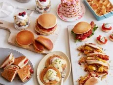 12 THINGS YOU SHOULD MAKE WITH PANCAKES  1. Pancake Grilled Cheese 2. BLT Pancake 3. Peanut Butter and Jelly Pancake Sandwich 4. Pancake Ice Cream Sandwich 5. Pancake Tacos 6. Pancake Whoopie Pies 7. PancakeCake 8. Pancake Bread Pudding 9. Pancake Parfait 10.Pancake Eggs Benedict 11.Pancake Quesadilla 12.Pancake Canapes 12 Things You Should Make with Pancakes Food Network Kitchen Food Network Grilled Cheese, BLT, Peanut Butter and Jelly, Tacos, Ice Cream Sandwich, Whoopie Pies, PancakeCake, Bread Pudding, Pancake Parfait, Eggs Benedict, Quesadilla, Canapes
