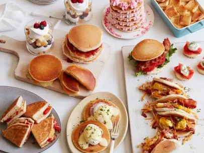 12 THINGS YOU SHOULD MAKE WITH PANCAKES  1. Pancake Grilled Cheese 2. BLT Pancake 3. Peanut Butter and Jelly Pancake Sandwich 4. Pancake Ice Cream Sandwich 5. Pancake Tacos 6. Pancake Whoopie Pies 7. PancakeCake 8. Pancake Bread Pudding 9. Pancake Parfait 10.Pancake Eggs Benedict 11.Pancake Quesadilla 12.Pancake Canapes 12 Things You Should Make with Pancakes Food Network Kitchen Food Network Grilled Cheese, BLT, Peanut Butter and Jelly, Tacos, Ice Cream Sandwich, Whoopie Pies, PancakeCake, Bread Pudding, Pancake Parfait, Eggs Benedict, Quesadilla, Canapes