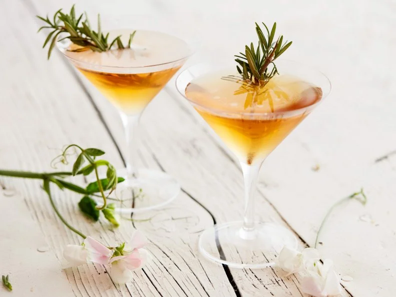 FNK ELDERFLOWER RUSTY NAIL Food Network Kitchen Food Network Single Malt Scotch, Elderflower Liqueur, Bitters, Rosemary