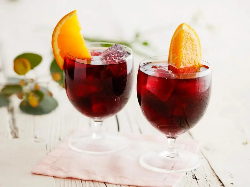 Food Network Kitchen Food Network Ginger, Sugar, Dried Hibiscus Flowers, Dark Rum, Oranges