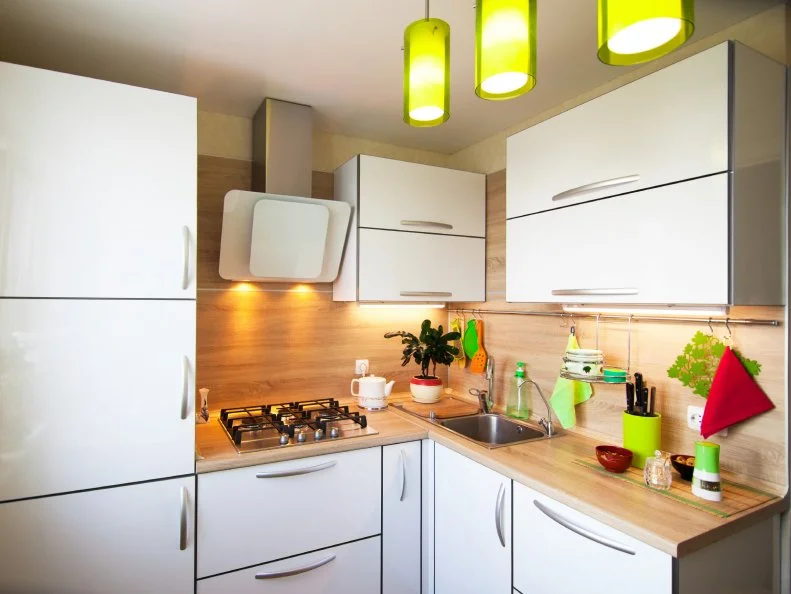 White and brown interior for small kitchen with green elements