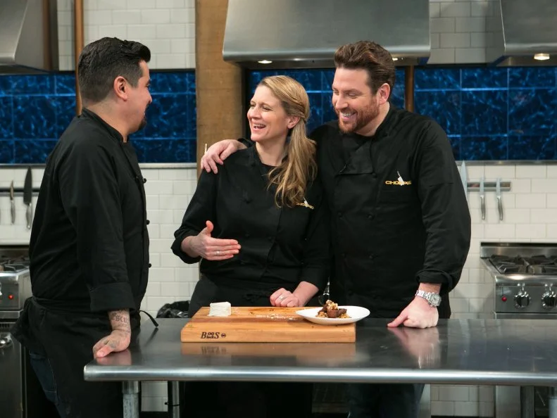Chefs: Aaron Sanchez jokes with Amanda Freitag and  Scott Conant after finishing their dishes that must have included: cherry drink soaked pickles, lamb chops, kale chips and ricotta salata, as seen on Food Network's Chopped After Hours, season 21.