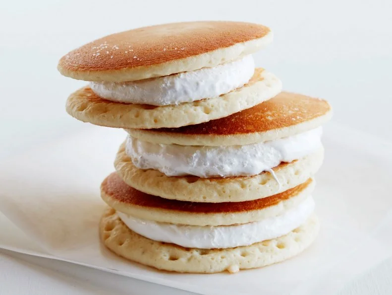 12 THINGS YOU SHOULD MAKE WITH PANCAKES  1. Pancake Grilled Cheese 2. BLT Pancake 3. Peanut Butter and Jelly Pancake Sandwich 4. Pancake Ice Cream Sandwich 5. Pancake Tacos 6. Pancake Whoopie Pies 7. PancakeCake 8. Pancake Bread Pudding 9. Pancake Parfait 10.Pancake Eggs Benedict 11.Pancake Quesadilla 12.Pancake Canapes 12 Things You Should Make with Pancakes Food Network Kitchen Food Network Grilled Cheese, BLT, Peanut Butter and Jelly, Tacos, Ice Cream Sandwich, Whoopie Pies, PancakeCake, Bread Pudding, Pancake Parfait, Eggs Benedict, Quesadilla, Canapes