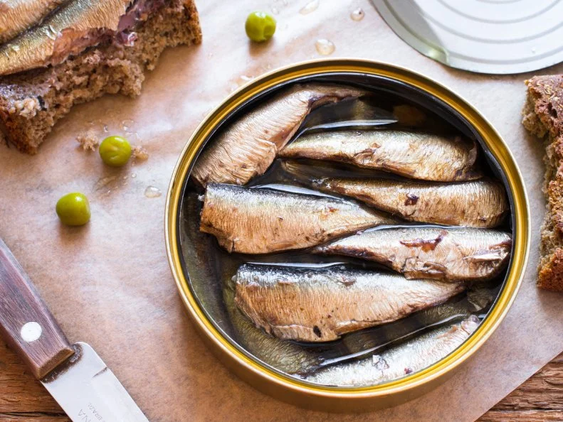 Tin can of sprats, sardines. Top view
