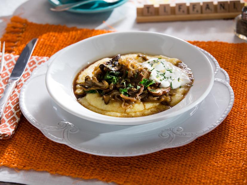 Beef and mushroom stroganoff on a bed of polenta prepared by host Tiffani Thiessen, as seen on Cooking Channel's Dinner at Tiffani's, Season 2.