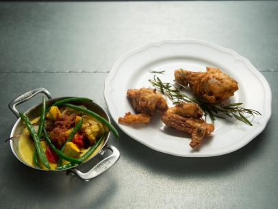 Food beauty of Wayfare Tavern fried chicken, oven roasted ratatouille and summer corn purée, from the team with Host Tyler Florence and contestant Lawrence Crawford, during the final menu challenge, as seen on Food Network’s Worst Cooks In America, Season 8.