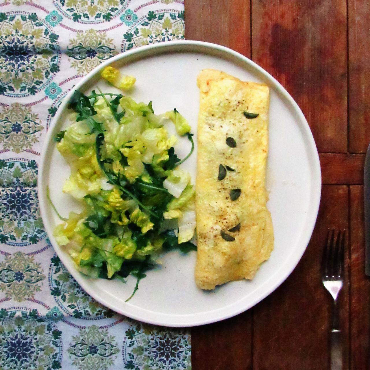 https://food.fnr.sndimg.com/content/dam/images/food/fullset/2016/3/2/0/FN_Workman-Omelet-How-To-Recipe_s4x3.jpg.rend.hgtvcom.1280.1280.suffix/1456942979823.jpeg