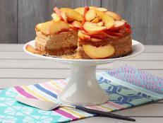 Food Network Kitchen’s Slow-Cooker Brown Sugar Cheesecake for Summer Slow Cooker/Zucchini Fries/Picnic Brick-Pressed Sandwiches, as seen on Food Network.