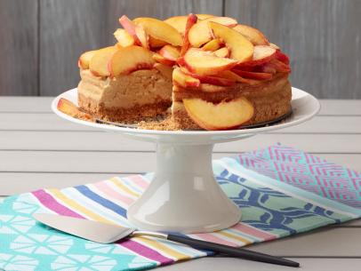 Food Network Kitchen’s Slow-Cooker Brown Sugar Cheesecake for Summer Slow Cooker/Zucchini Fries/Picnic Brick-Pressed Sandwiches, as seen on Food Network.
