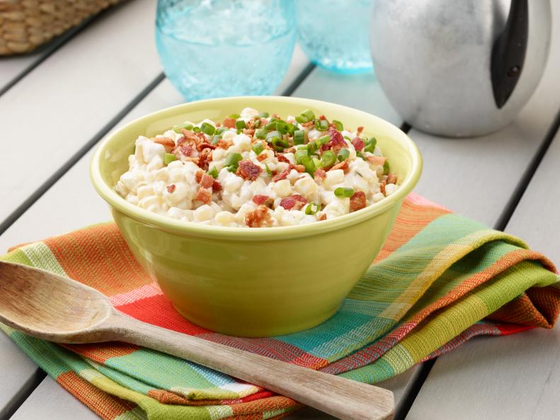 FNK_SlowCookerCreamedCorn_H Food Network Kitchen’s Slow-Cooker Creamed Corn for Summer Slow Cooker/Zucchini Fries/Picnic Brick-Pressed Sandwiches, as seen on Food Network.