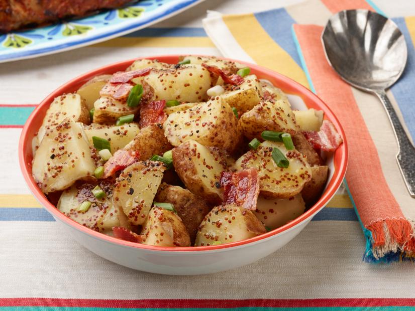 Food Network Kitchen’s Slow-Cooker German Potato Salad for Summer Slow Cooker/Zucchini Fries/Picnic Brick-Pressed Sandwiches, as seen on Food Network.